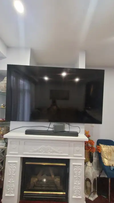 TV for sale (100% working) with 1 thick black line in the centre, View more