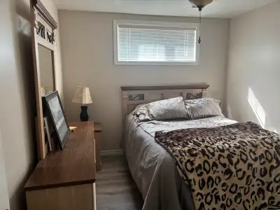 Beautiful queen bedroom set Headboard rails dresser mirror and side table Solid wood Can add mattres...