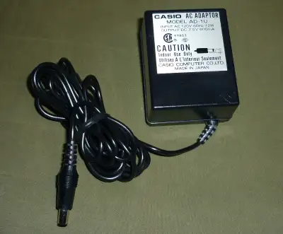 Official Casio AC adapter for 1980's and 1990's era keyboards. Made in Japan Specs are 7.5V DC, 600m...