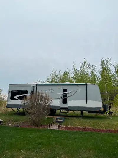 REDUCED FOR QUICK SALE!!!!! $30200 from $32500. CAMPGROUND READY Our RV has made a short haul to Red...