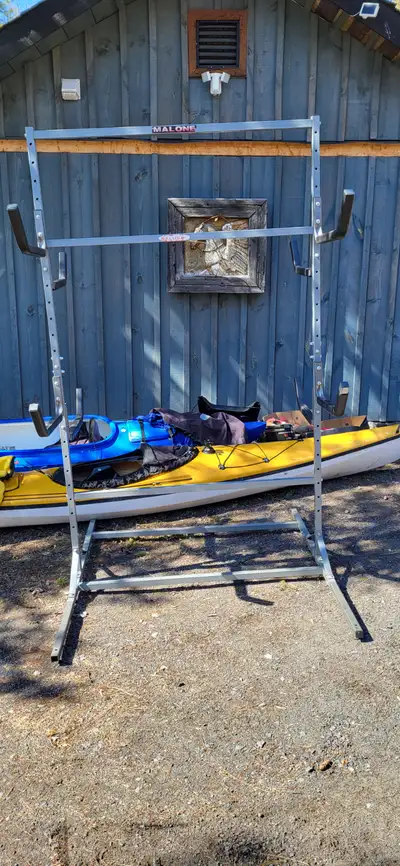 Great all-metal 6 slot super space saver kayak rack. $200, save big store smart.