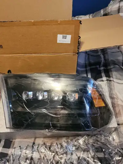 AlphaRex Headlights Only taken out of the box to capture proper pictures. Brand new never installed...