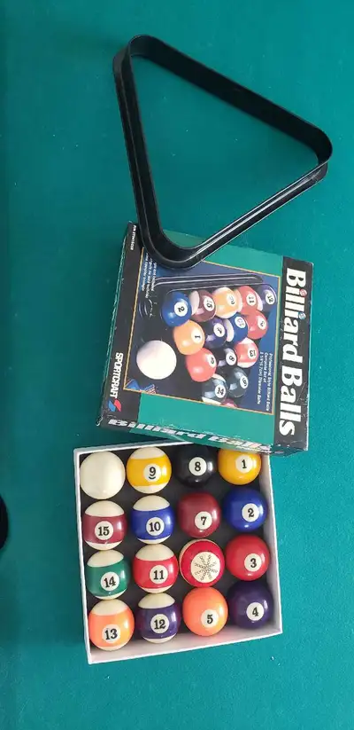 Set of pool cues and billiard balls, View more
