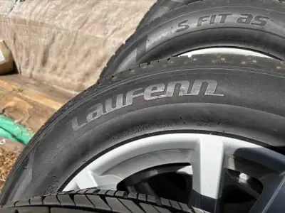 Rims from 2014 Camaro , tires used for 3 months last summer . Tires next to new . All season tires ....