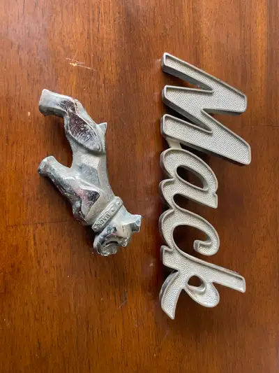 2 Mack truck emblems for sale Will not separate $25