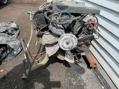 Chevy engine 305 TBI, 700R4 transmission, drive shaft and posi axle all from a Caprice wagon for sal...