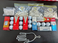 New golf balls, tees, glove stretcher. Retail $75 Sell $20 obo
