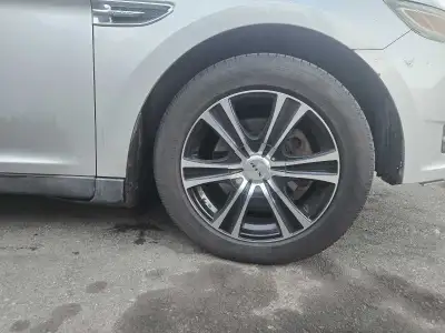 Selling set of 18" rtx rims on 235/55/18 perelli tires. Tires are still decent, rims are still mint...