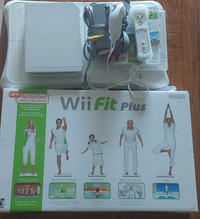 Wii with Wii Fit Plus controls and cables