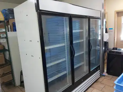 This is 3 door glass cooler; over 2 miter wide. Very good condition. There is a small compressor ene...
