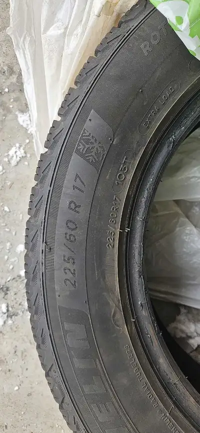 Like new four Michelin winter tires; 225/60R17 103T. Will fit 17" rims. These tires were on a Jeep C...