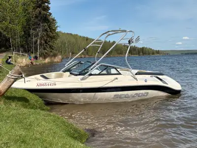 This Sea Doo twin engine Jet boat with wakeboard tower is a blast to drive! It turns on a dime and h...