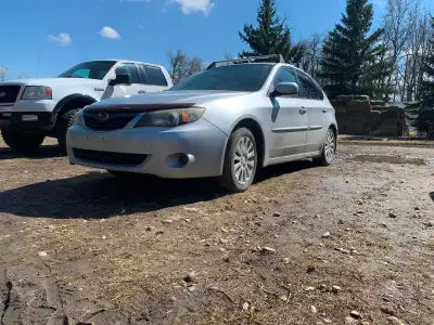 Tossing the idea of selling my car. 2008 Subaru Impreza 2.5l, 5 speed manual transmission, 189000 mi...