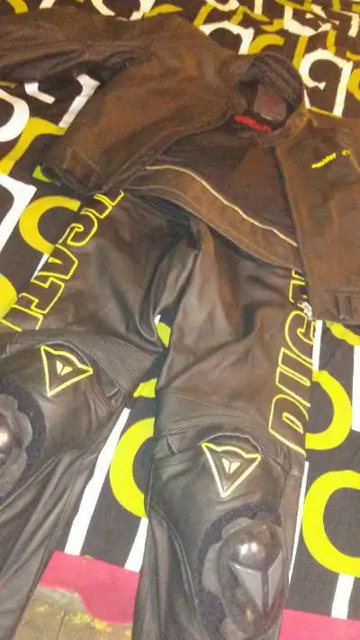 Black and yellow dainese 54 jacket n pants leather full suit. Its all new and its a small. Codation;...