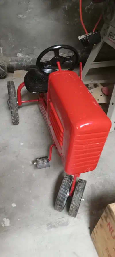 Great old tractor pedal car in great condition, located Paris Ont, pick up only