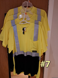 8 New Construction safety shirts + 2 vests.