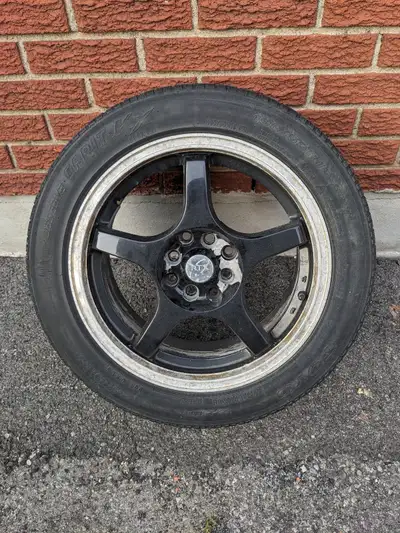 Four 16" RTX brand aluminum wheels with old winter tires. 4x100 16x7 JJ 54.1mm center bore. Tires ar...