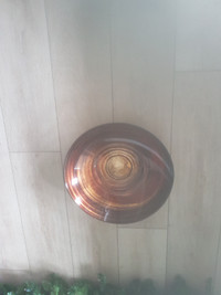 A rust & gold coloured swirl-effect bowl