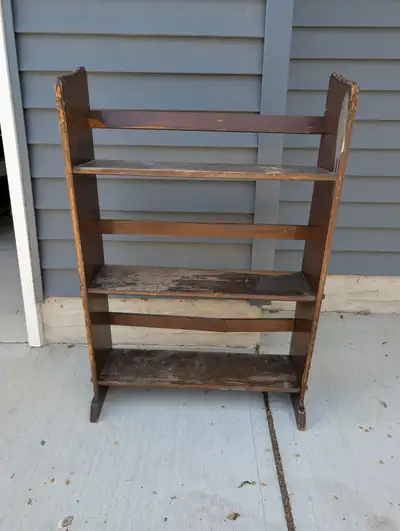 I have a solid wood book shelf for sale in Southwest Edmonton — near Southgate Mall. Measures 24 inc...