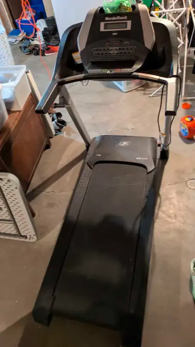 Good condition NordicTrack treadmill. Older but barely used. Comes with belt lubricant. Can help loa...
