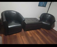 2 black Leather Swivel Accent Chairs & Ottoman