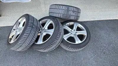 18 inch Mercedes Rims and pirellie tires. Used for 2 years and still in good shape