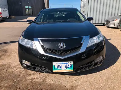 For sale is a sleek, black 2010 Acura TL, a used sedan with an automatic transmission, offering both...