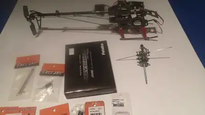 Complete upgraded Trex 250 kit. Unused with new motor and new in box gyro. Plenty of new spare parts...