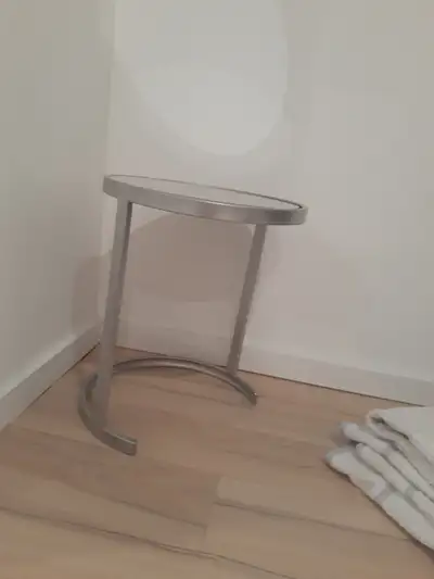 Grey round mirrorred side table, View more