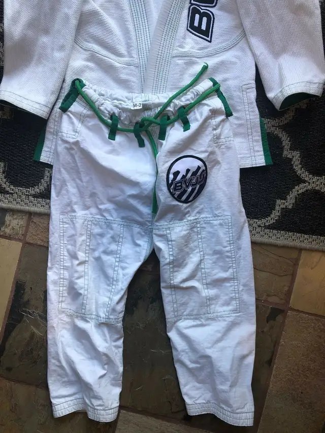2 Kids jujitsu suits 6-9 and 10-13. Near new condition. in Kids & Youth in Calgary - Image 3