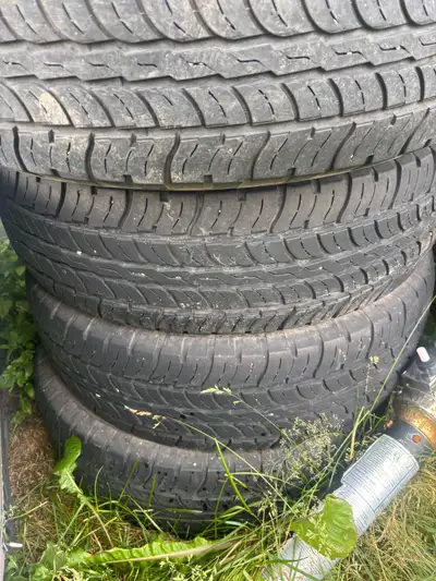 245/65/17 tires . 4 of them . 2 about 70 percent , 2 about 80 percent . 200 text 7808176666