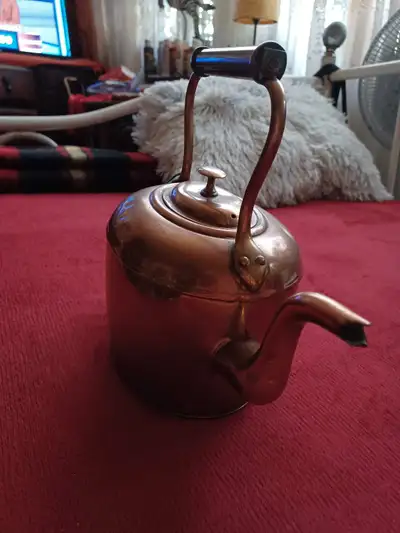 An unusual piece: This oval Victorian Copper Kettle (brought to Canada in 1880) was intended for use...