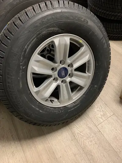 These are Michelin X-Ice winter tires, size LT265/70R17 on Ford Alloy rims. With TMPS sensors. They...