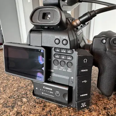 Canon C100 with autofocus upgrade, View more