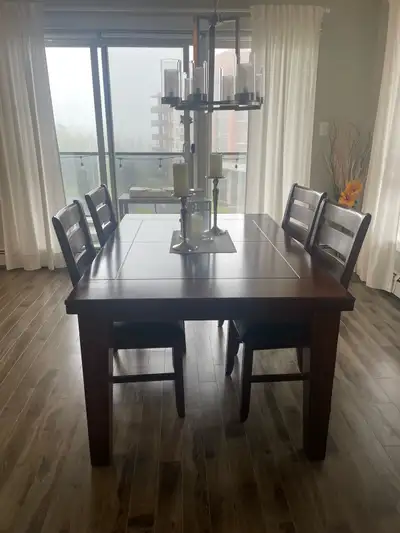 Matching Table, 6 chairs and hutch (picture of hutch represents the color more accurately) Table is...