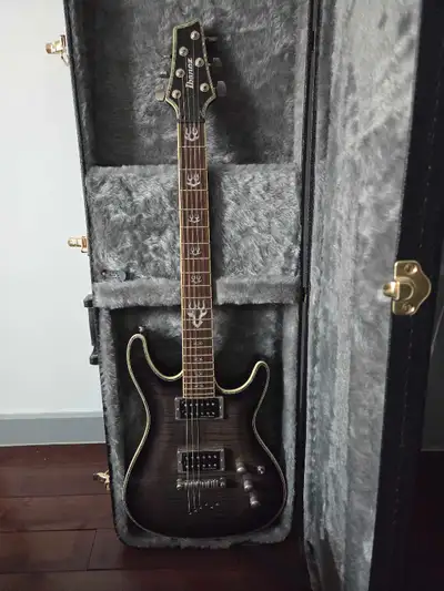 This includes the pre owned electric guitar with mink lined Canadian made case. Free wah pedal that...