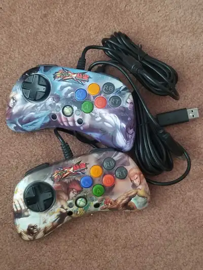 Used but working Visible wear and tear is on the underside of the controllers.