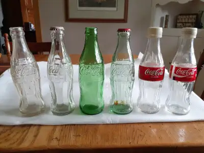 Variety of 6 oz. Coca Cola glass bottles, View more