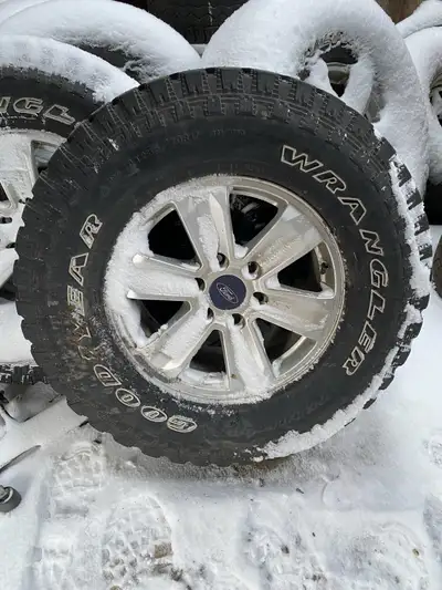 Good year wranglers 285 70 17 Studded Older tires used last year worked fine 75 % tread Ford F150 ri...
