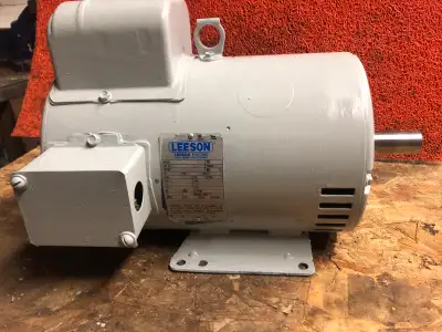 Leeson . 7.5 HP . 3450 RPM . 184 T , 11/8” shaft . 230 v . 1 phase . OBO
