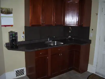 ONE BEDROOM UPPER APT. WITH DEN IN OLD SOUTH.  AVAILABLE AUG. 1