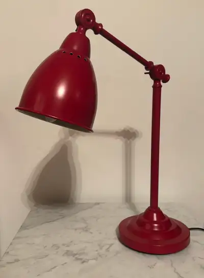 Adjustable IKEA table lamp. Beautiful raspberry colour. Cash only, downtown Montreal.