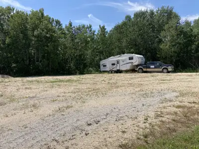 Outdoor storage for rv, camper,boat, trailer, atv, vehicles. Gravel parking on private yard(so monit...