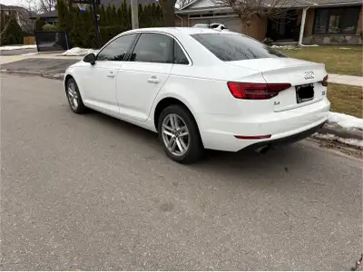 White on brown interior. Automatic. Regular maintenance. Great shape. 199,900 km.