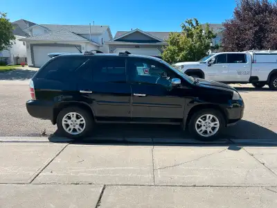2006 Acura MDX touring $6500 obo 277k Car starter DVD player Leather seats All weather tires 7 seate...