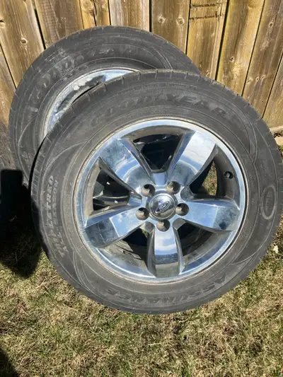 Selling a set of four chrome Ford rims, each fitted with all-season tires size 215/65R17. These used...