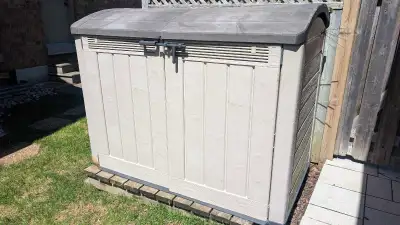 Used storage shed for only $50. New one is norsov $600. The lid on one side broke so it has been rei...