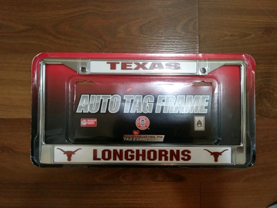 Texas Longhorns Auto License Plate Tag Frame. Brand new in package!! Officially Licensed Collegiate...