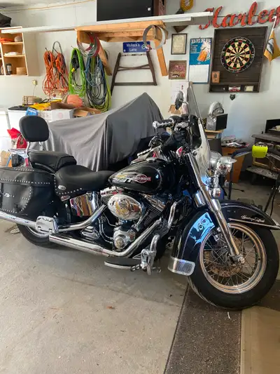 $10,900 Or best offer. Runs great and looks awesome, Stereo, heated garage storage, new rubber, Vanc...