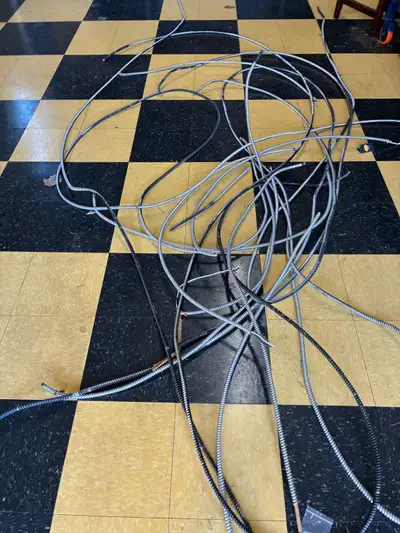 Various lengths of used 10/2 armoured cable. Buck a foot. Let me know what you need.